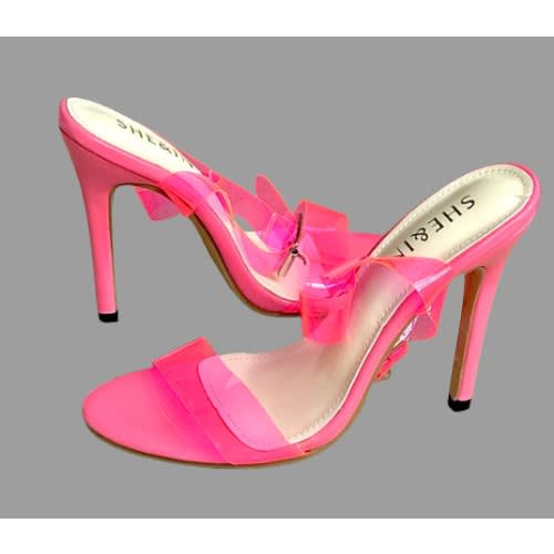 She & in Ladies heeled  Sandals