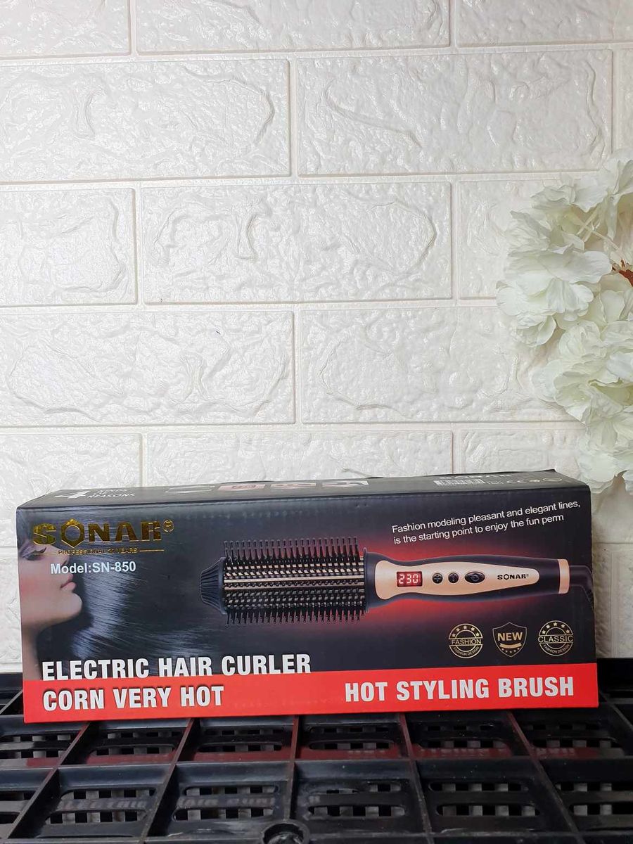 ELECTRIC HAIR CURLER AND HOT STYLING BRUSH