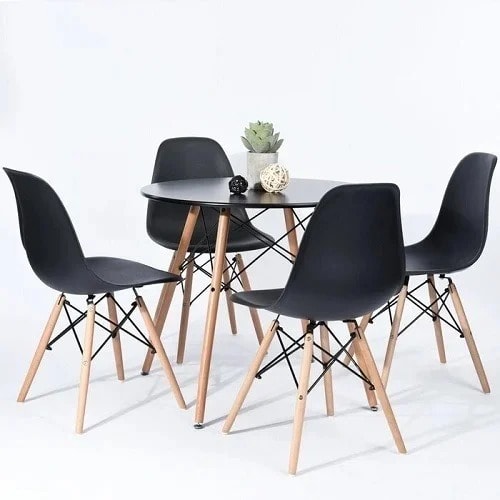 A Set Of Modern Dining Table With Four Chairs