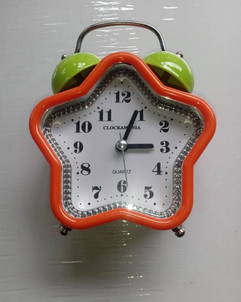 Orange Star Alarm Clock With Green Bells