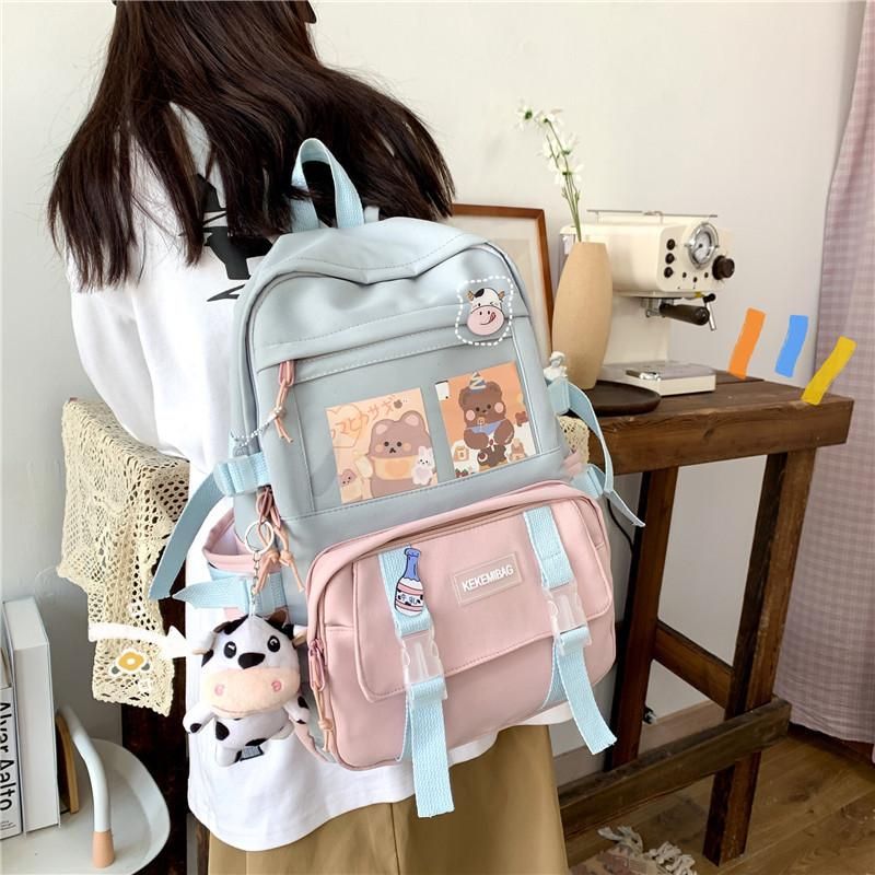 Ins schoolbag female cute girl Korean version of Harajuku ulzzang junior high school students fourth, fifth and sixth grade backpack Pink pendant with badge