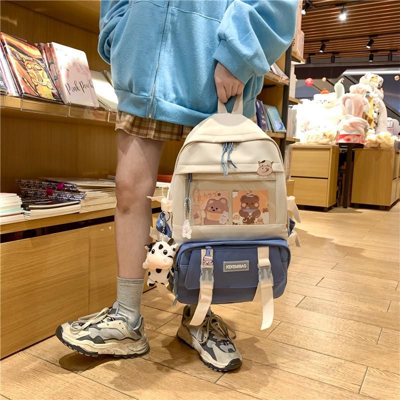 Ins schoolbag female cute girl Korean version of Harajuku ulzzang junior high school students fourth, fifth and sixth grade backpack Pink pendant with badge