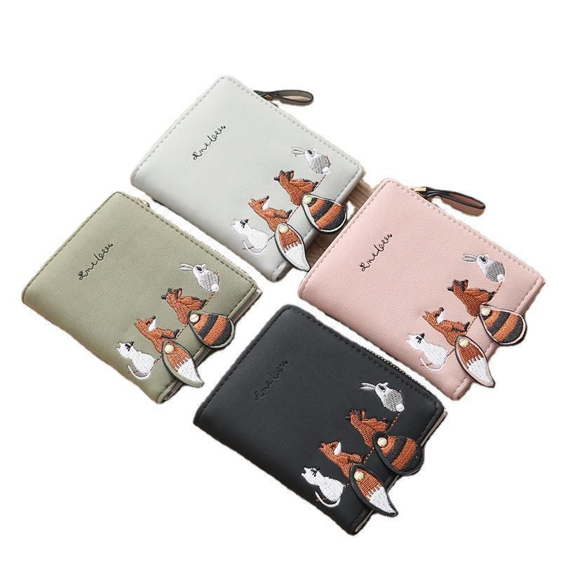 New female short student wallet Korean version cute small fresh folding mini trendy personalized coin purse Dark green