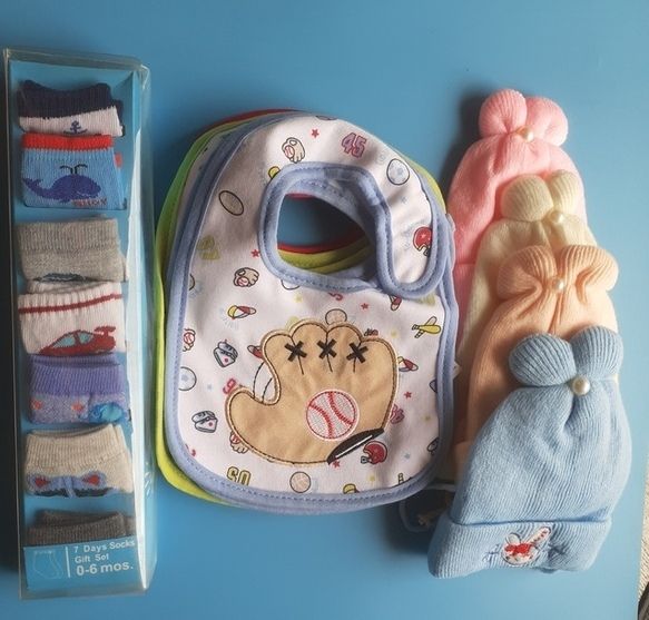 6 Baby Bibs 7 Pairs Of Socks And 4 Baby Caps