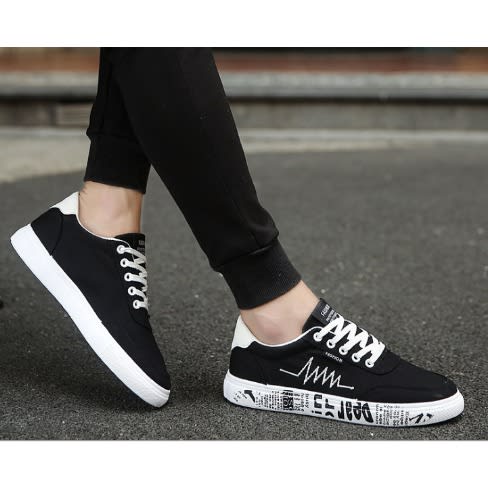 Black Sneakers With White Design