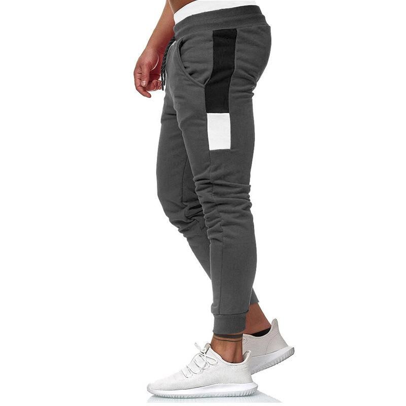 Adjusted sports pants for men casualties fashionable black gray and red winter and autumn novelty