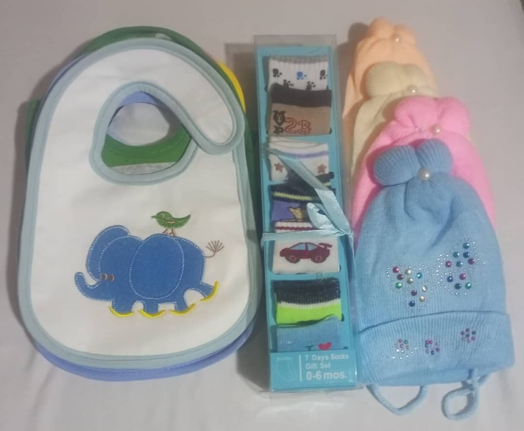 6 Baby Bibs 7 Pairs Of Socks And 4 Baby Caps