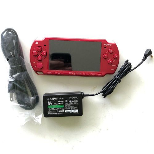 PSP SLIM WITH 32BG MEMORY CARD WITH GAMES INSTALLED