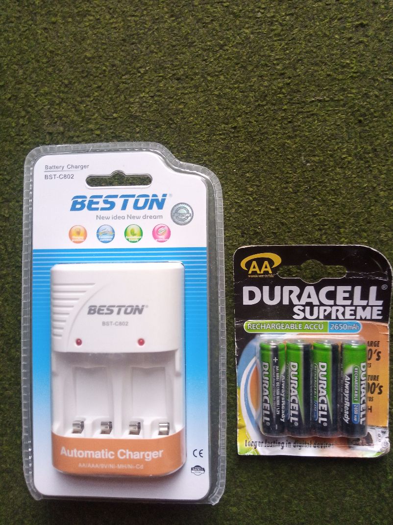 Charger With AA Duracell Rechargable Batteries