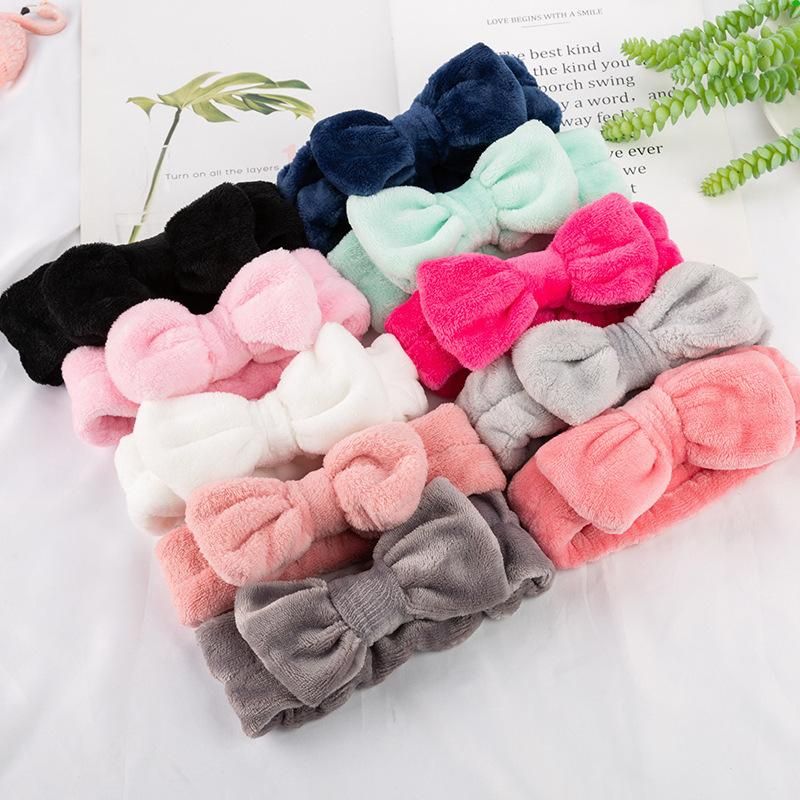 European and American coral fleece bow headband ladies wide-brimmed wash solid color headband flannel headband fashion headwear tooth pink