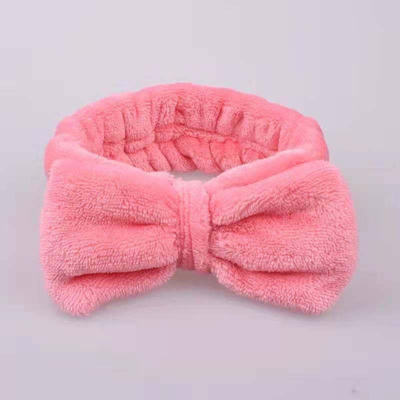 European and American coral fleece bow headband ladies wide-brimmed wash solid color headband flannel headband fashion headwear tooth pink