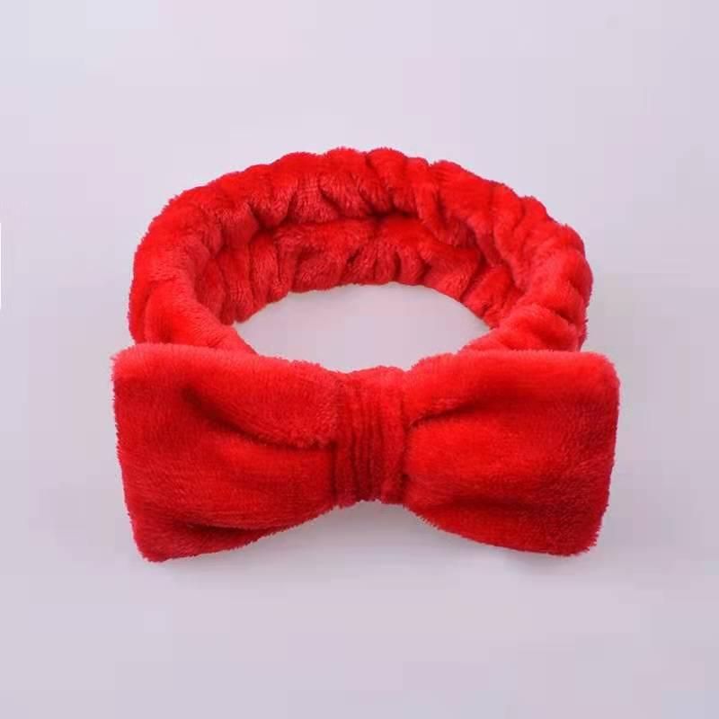 European and American coral fleece bow headband ladies wide-brimmed wash solid color headband flannel headband fashion headwear tooth pink