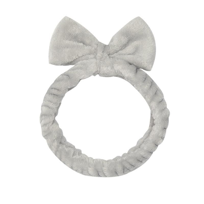 European and American coral fleece bow headband ladies wide-brimmed wash solid color headband flannel headband fashion headwear tooth pink