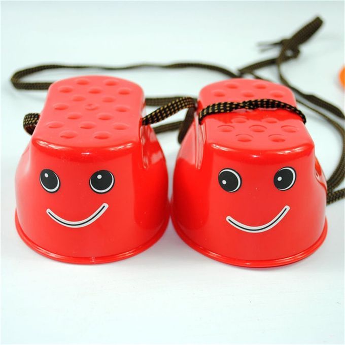 Children Kids Outdoor Fun Walk Stilt Jump Smile Face Balance Training Toy