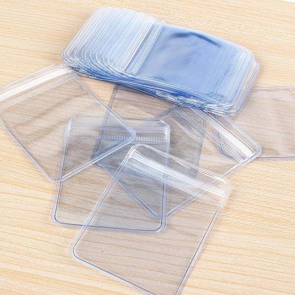 100Pcs Clear Clear Crystal PVC Plastic Coin Bag Case Wallets Storage Envelopes New 70 X 50 Mm
