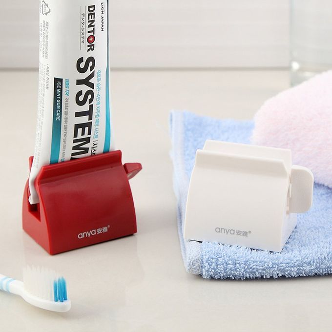 Multifun Tional Bathroom Plasti  Squeezing Dispenser Rolling Tube  R-white
