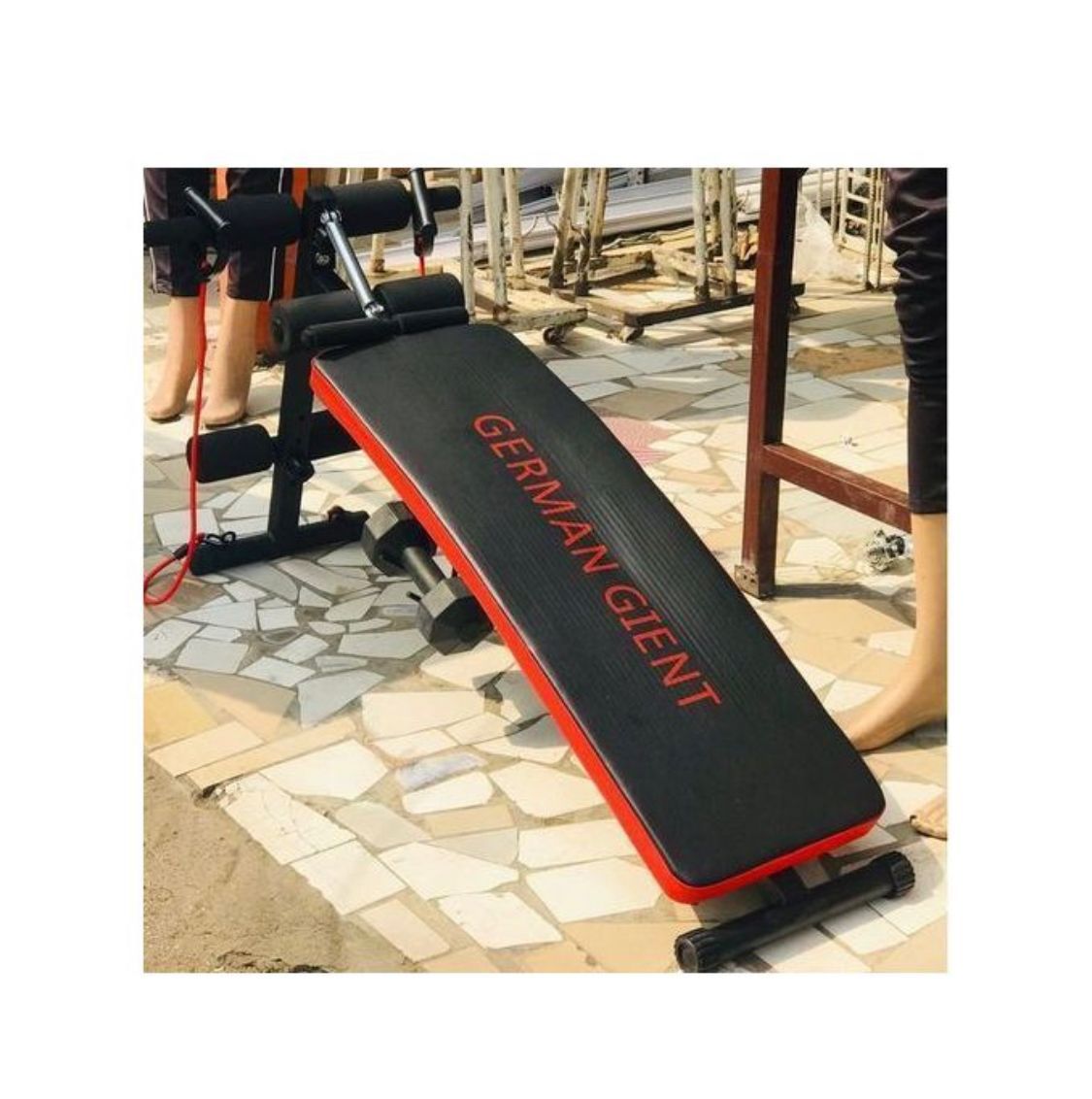 Sit Up Bench With Dumbbells And Pull Up Spring For Arm Coiling Exercise And Exercise Ball.