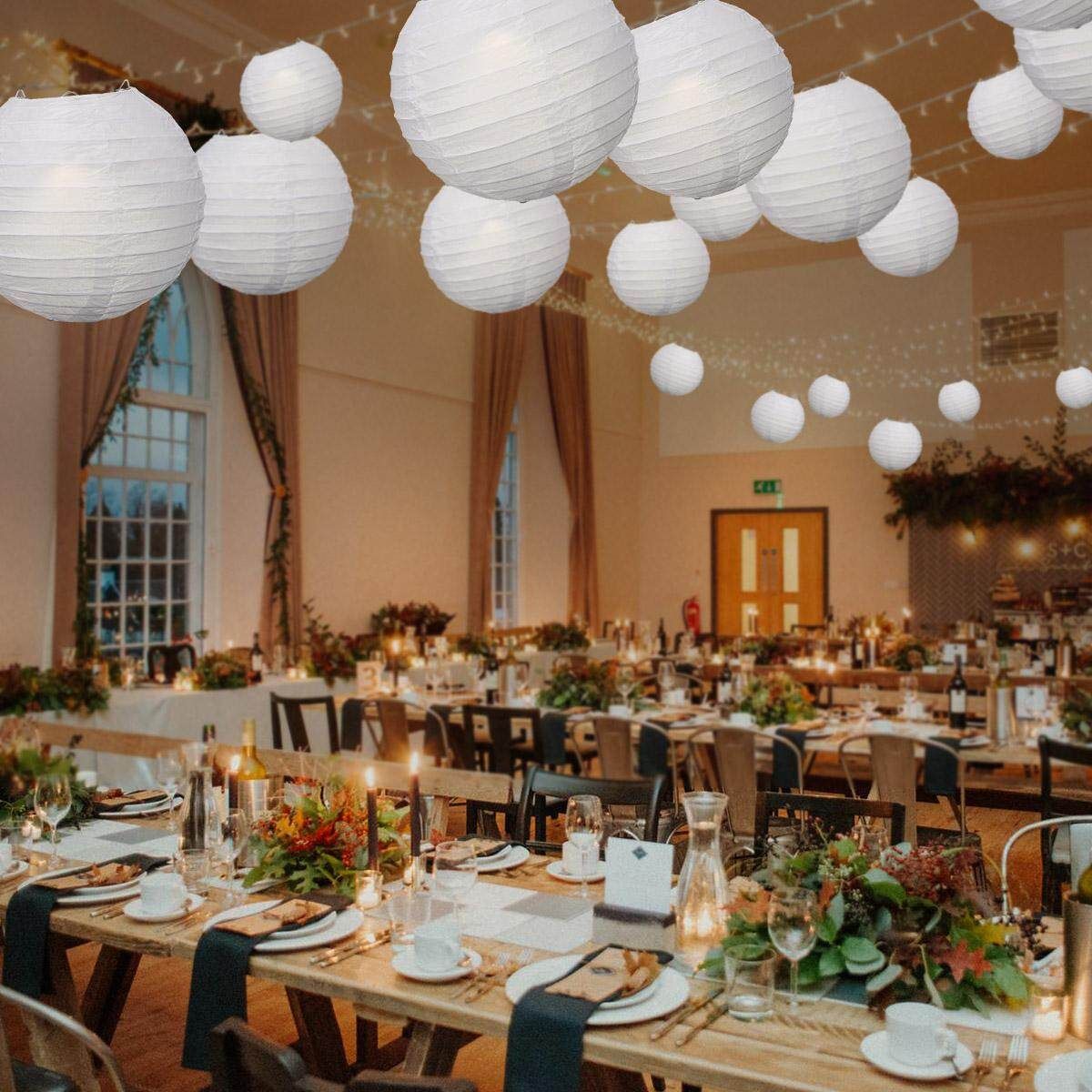 20 Packs Of White Paper Lanterns In A Circle With A Single Bag Containing 20 Sets Of Bags