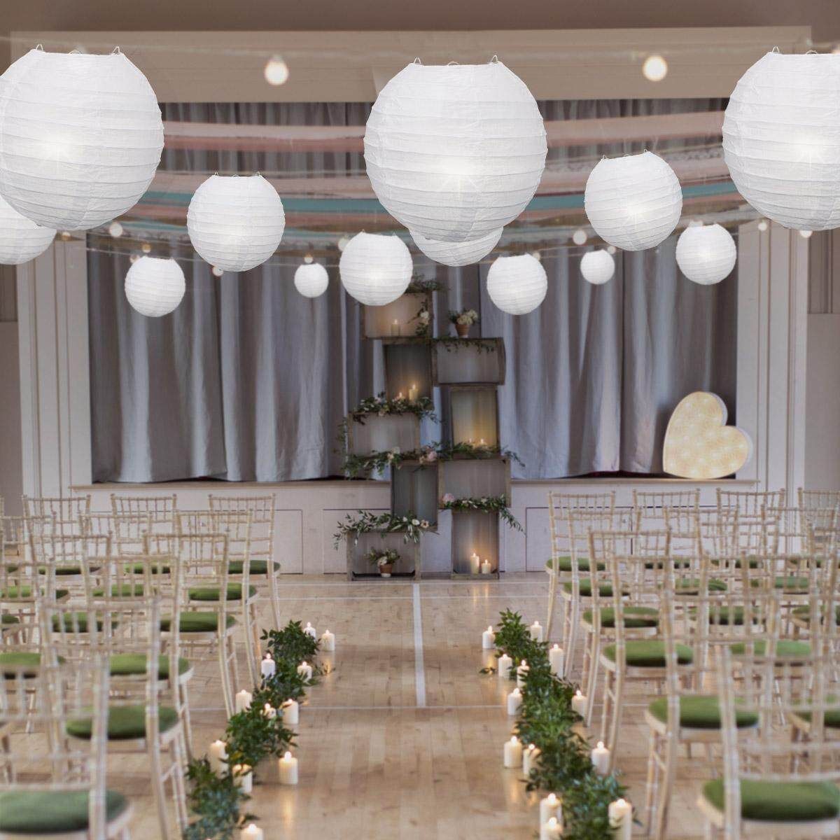 20 Packs Of White Paper Lanterns In A Circle With A Single Bag Containing 20 Sets Of Bags