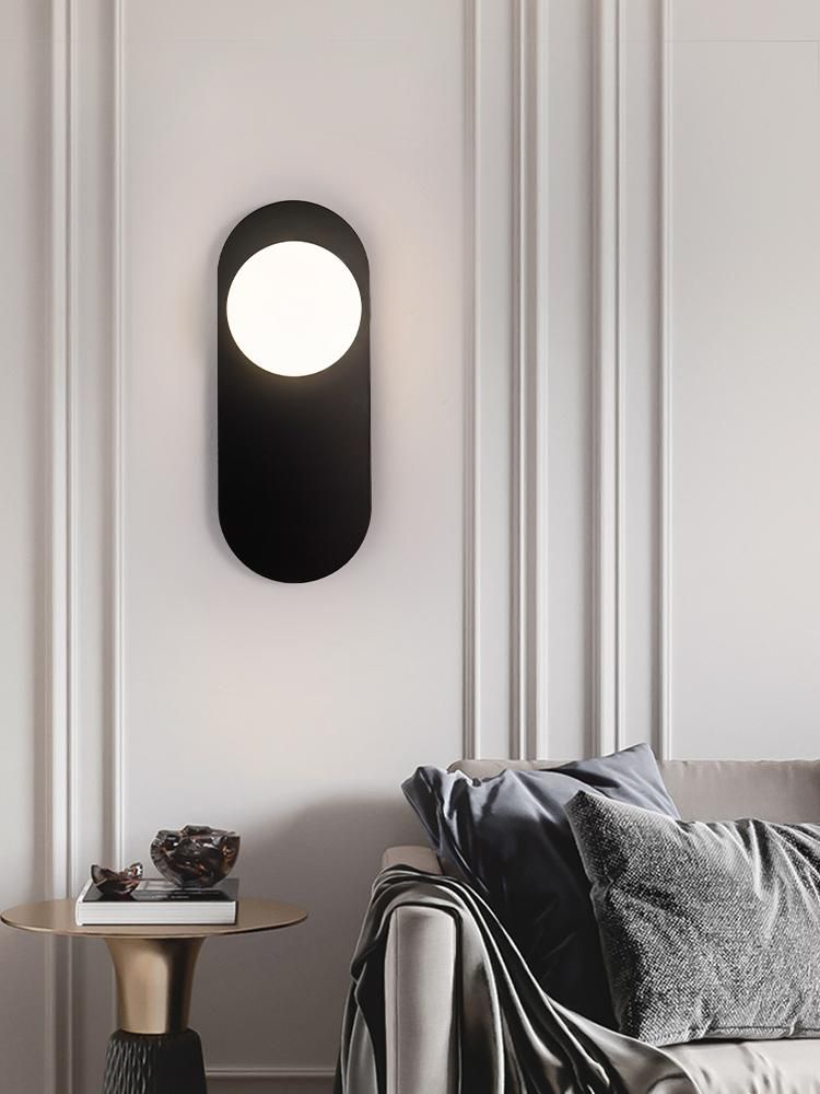 Minimalistic bedside wall lamp in the hallway