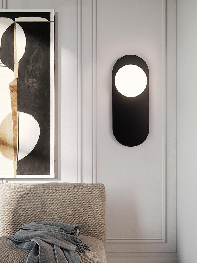 Minimalistic bedside wall lamp in the hallway