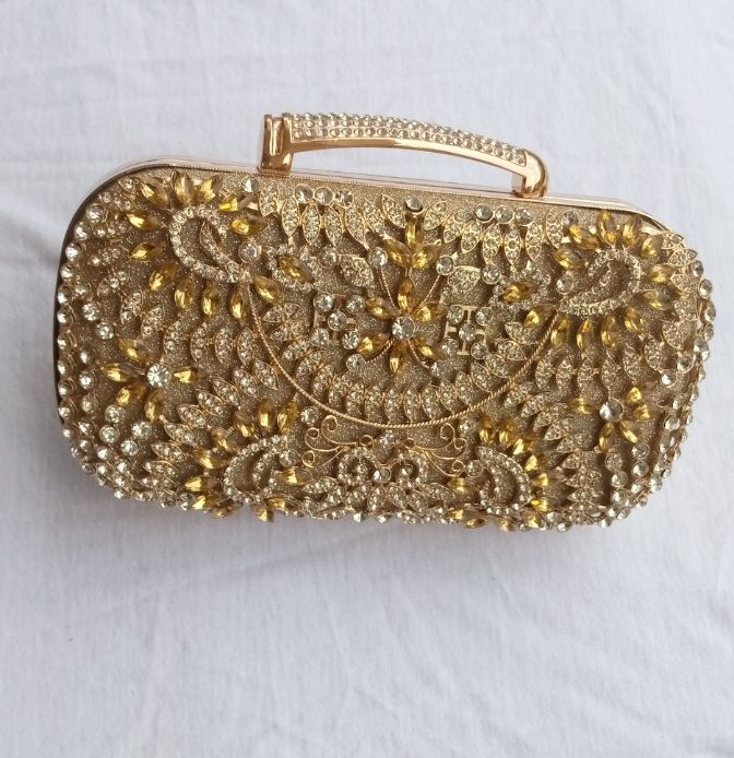 Gold Shimmery Ladies Purse With Petals.