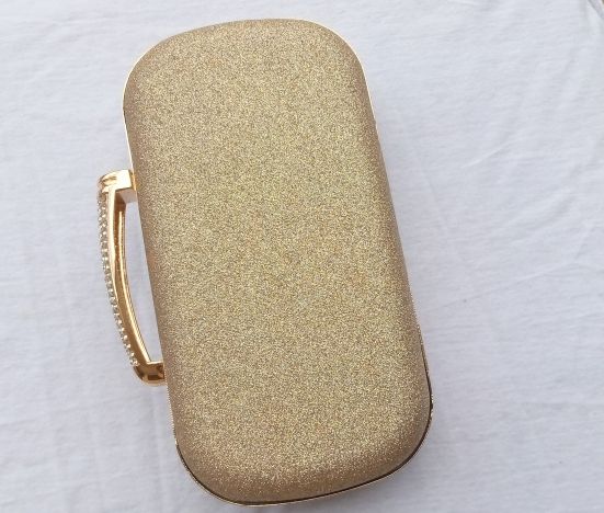 Gold Shimmery Ladies Purse With Petals.