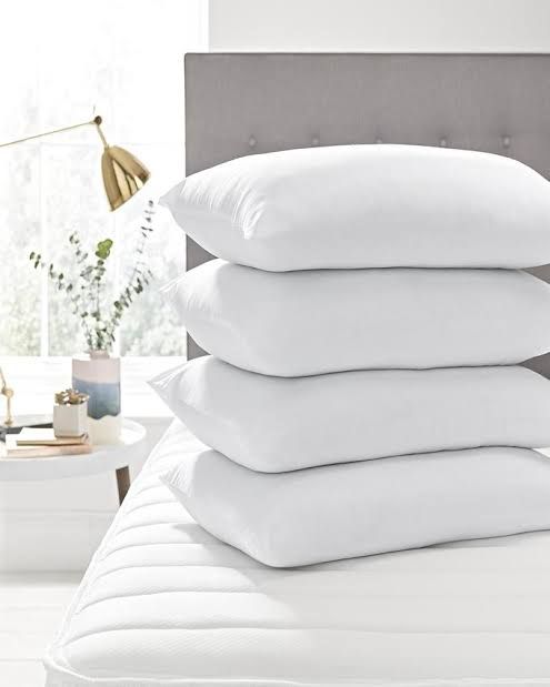 4 Comfortable Full Fibre Pillows And Two Pillow Cases