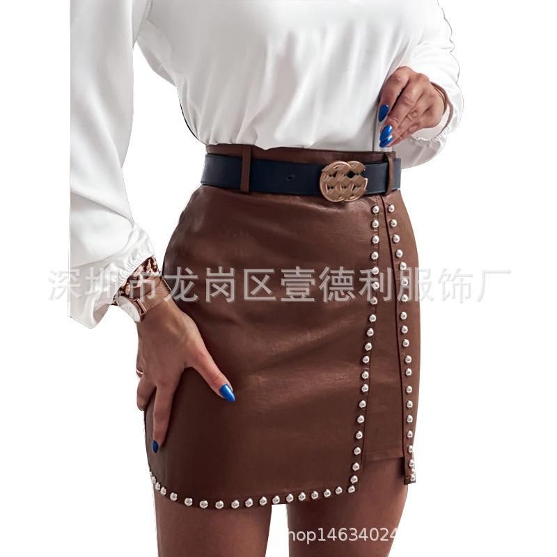 Women's leather skirt Sexy leather studded half length skirt Split buttocks skirt Autumn and winter