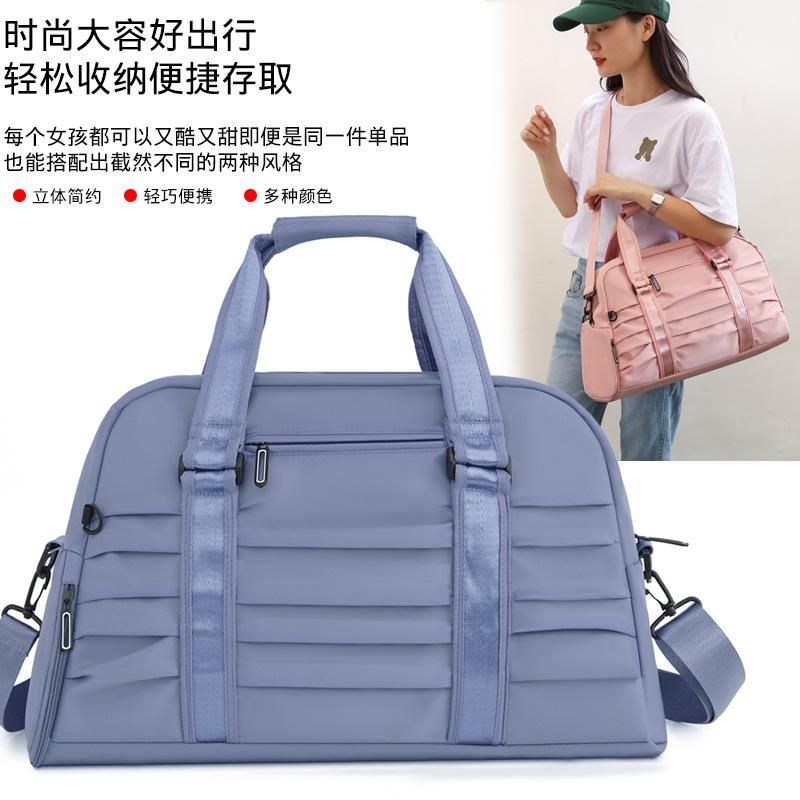 New pleated hand luggage bag large capacity short-distance travel bag wet and dry separation fitness bag swimming bag women's bag Pink