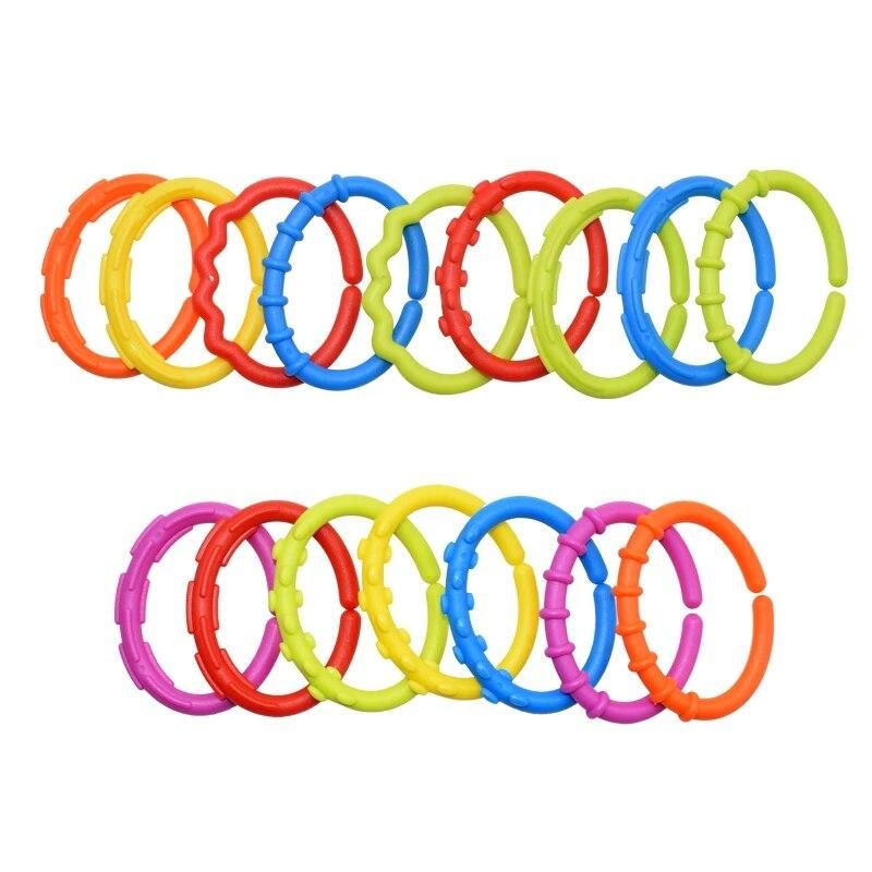 24pcs/lot New Rainbow Ring Rodent Baby 24 Months Teether Car Hanging Kids Bed Hanging Card Teethers Toys For Children