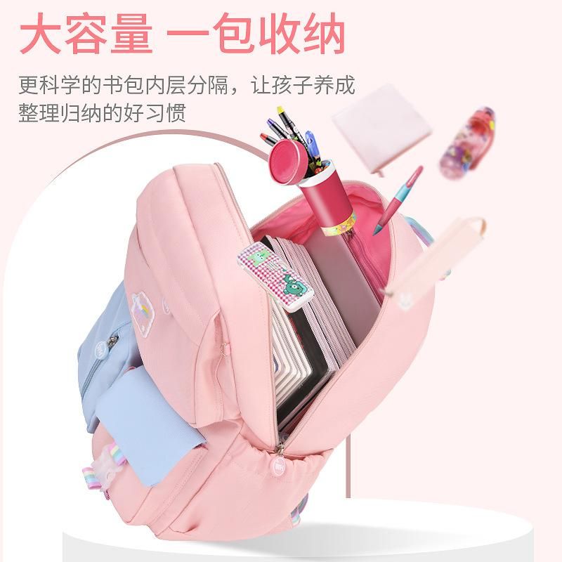 New schoolbags for primary school students grades 1-3-6 waterproof wholesale Korean version of the burden relief ridge cute children's backpack 318 Powder with Blue Large + Tutorial Bag