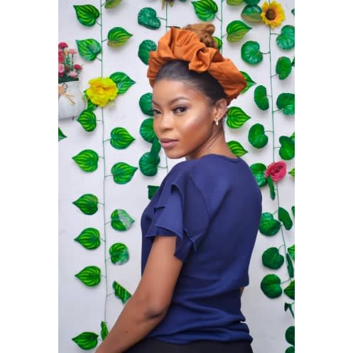 Eunice's Navy Blue Top With Double Flare Hand